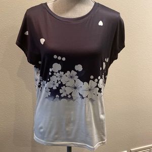 NAVY BLUE AND WHITE WITH FLOWERS WOMEN'S TOP.  PULLOVER SHORT SLEEVE.
